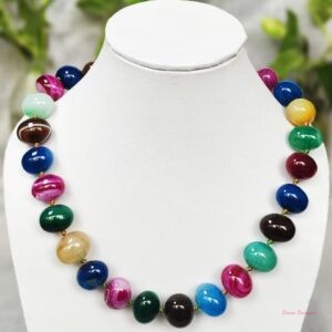 A striking mélange of ovoid-shaped bright tutti-fruiti coloured Onyx tumbles come together in this knotted 19” single strand necklace, with a strong spring-ring clasp for durability DN 0007