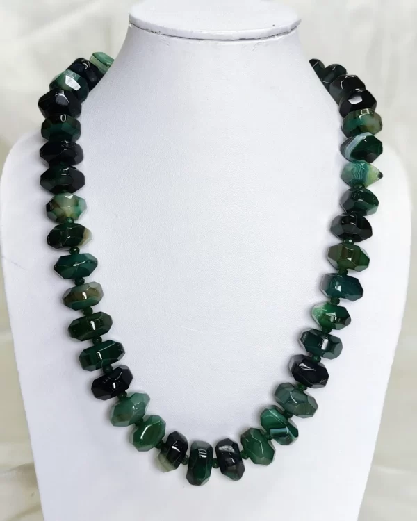 Green Glory - Double cushion cut beads of Onyx in all shades of sea and forest green flecked with varying shades of white come together in this knotted 18” single strand necklace. DN0034