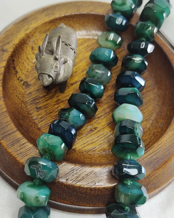 Green Glory - Double cushion cut beads of Onyx in all shades of sea and forest green flecked with varying shades of white come together in this knotted 18” single strand necklace. DN0034