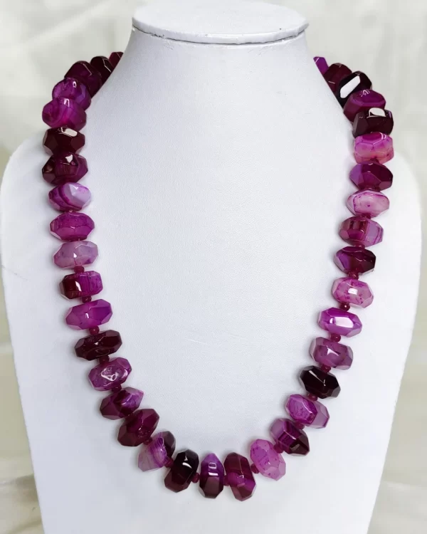 Pink Princess - Double cushion cut beads of Onyx in all shades of candy and bubblegum pink flecked with varying shades of white come together in this knotted 18” single strand necklace. DN0035