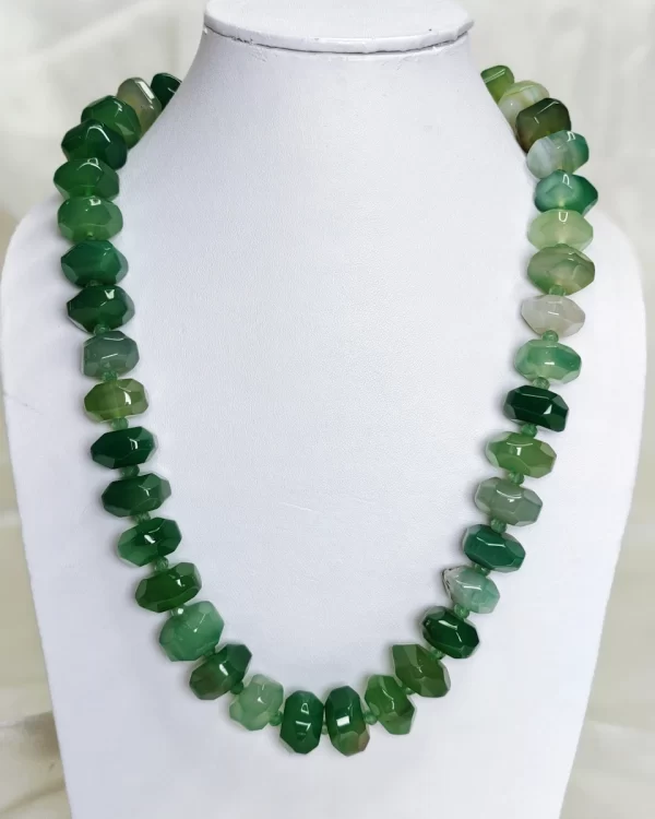 Green Queen - Double cushion cut beads of Onyx in all shades of tropical and monsoon green flecked with varying shades of white come together in this knotted 18” single strand necklace. DN0036