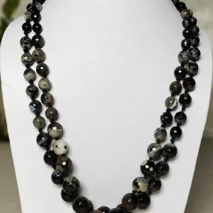 Classic Evenings - Knotted 18” double strand of Onyx beads graded by size, in a palette featuring a mélange of whites, blacks, and grays of all shades – with banding, splotching, and marbling patterns. DN0041