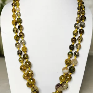 Melon Summer - Knotted 18” double strand of Onyx beads graded by size, in a palette featuring a mélange of melon, silver, and mustard yellows of all shades with banding, splotching, and marbling patterns, and griddled with dragon veins. DN0043