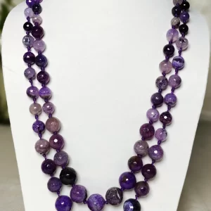 Lavender Love - Knotted 18” double strand of Onyx beads graded by size, in a palette featuring a mélange of lavender, light violets and indigo, and royal purple shades with banding, splotching, and marbling patterns, and griddled with dragon veins. DN0044