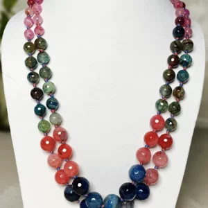 Bubble Gum - Knotted 18” double strand of Onyx beads graded by size, in a palette featuring a mélange of pinks, aqua greens, juicy reds, and sky blue shades with banding, splotching, and marbling patterns, and griddled with dragon veins. DN0048