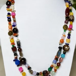 Vagabond - DN0059 - 36” of delight! A vast variety of beads, chips, and tumbles of Onyx, Agate, Chalcedony, Beryl, Iolite, Jasper, Apatite, Citrine, Tiger’s Eye, Calcite, Aventurine (and a host of others) strung up give that urban chic vibe.