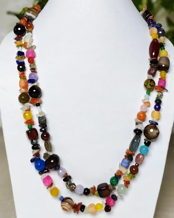 Vagabond - DN0059 - 36” of delight! A vast variety of beads, chips, and tumbles of Onyx, Agate, Chalcedony, Beryl, Iolite, Jasper, Apatite, Citrine, Tiger’s Eye, Calcite, Aventurine (and a host of others) strung up give that urban chic vibe.