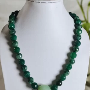 Green Vista - DN0121 - Mottled and splotched green honey-cut Onyx beads flank a lovely centre-of-attention pista-green tumble of Chalcedony in this 18” beauty.