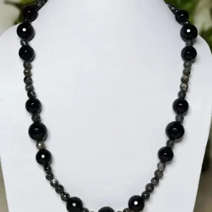 Black Flirt - DN0123 - Mottled and splotched gray small Onyx beads play partner to large honey-cut jet black Onyx beads in 20" of harmony