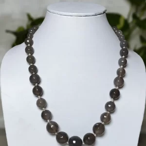 A Touch of Grey - DN0130 - Mottled and splotched light gray small-to-large graded honey-cut Onyx beads in a simple harmonious string of 16"