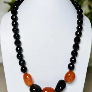 Firefly - DN0134 - Jet black honey-cut beads of Onyx set of a trio of Carnelian tumbles, mixed up with a couple of jet black Agate tumbles