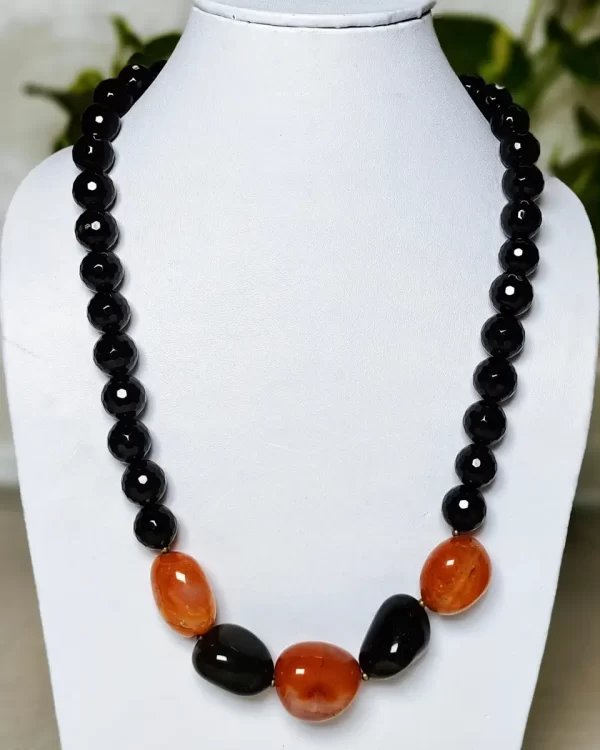 Firefly - DN0134 - Jet black honey-cut beads of Onyx set of a trio of Carnelian tumbles, mixed up with a couple of jet black Agate tumbles