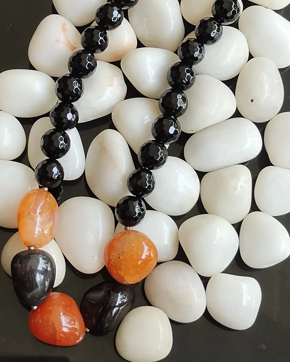 Firefly - DN0134 - Jet black honey-cut beads of Onyx set of a trio of Carnelian tumbles, mixed up with a couple of jet black Agate tumbles