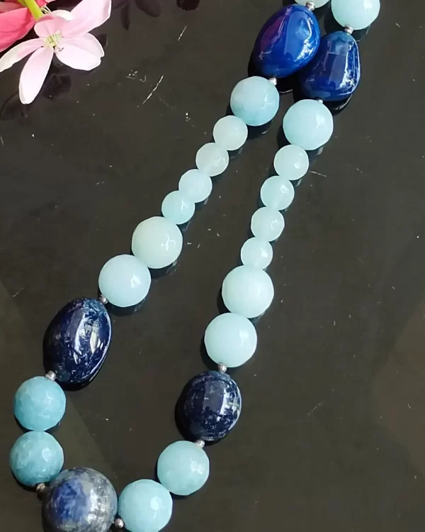 Blue Heaven - DN0136 - A collection of graded honey-cut beads of Onyx in a fetching shade of sky blue put together with a set of blue Apatite tumbles makes for a lovely 18" necklace