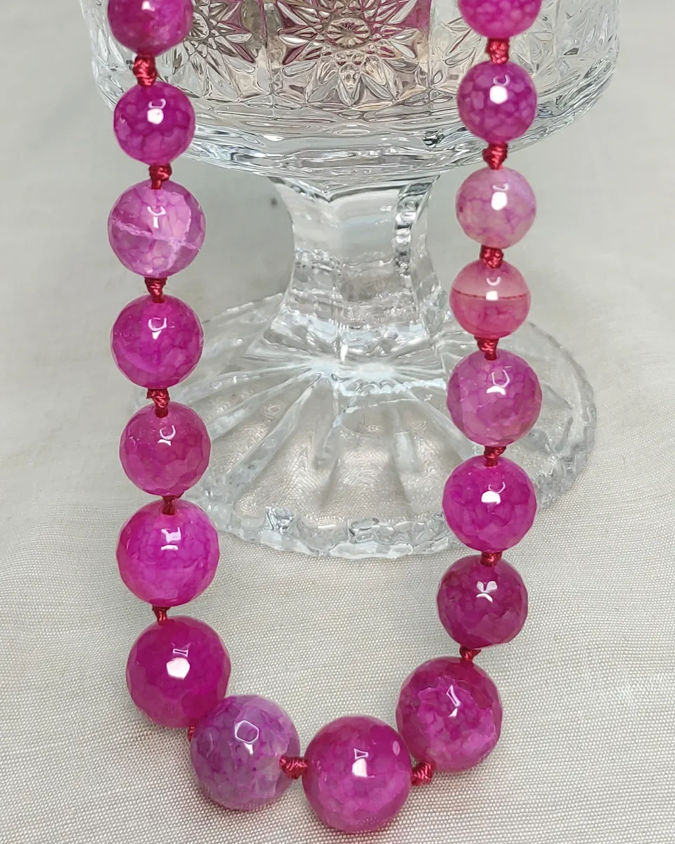 Pink Polka - DN0241 - Knotted 19” single strand of Onyx beads, in a wide palette of pinks with banding, splotching, and marbling patterns, and griddled with dragon veins.