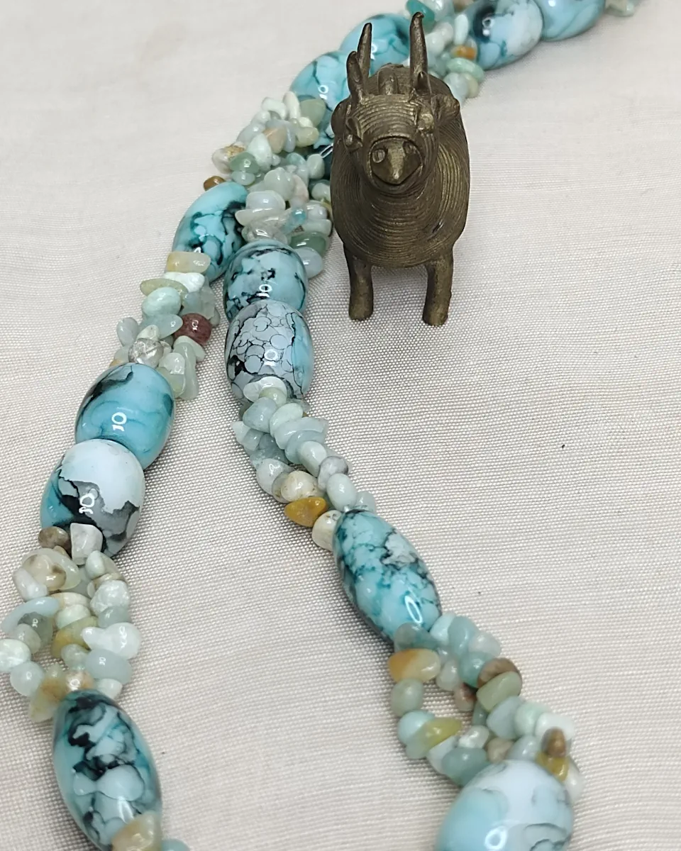 Turquoise Quest - DN0314 - Three lines of rock crystal rice chips in shades of turquoise and white, with Onyx beads with a striking pattern of turquoise banding, splotching, and marbling patterns, griddled with dragon veins come together in this 19” necklace.