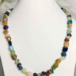 Gypsy Joy - DN0328 - Bright tumbles of agate, onyx, feldspar, iolite, and quartz come together in a freewheeling random design while sending out with a youthful vibe in this 19” necklace.