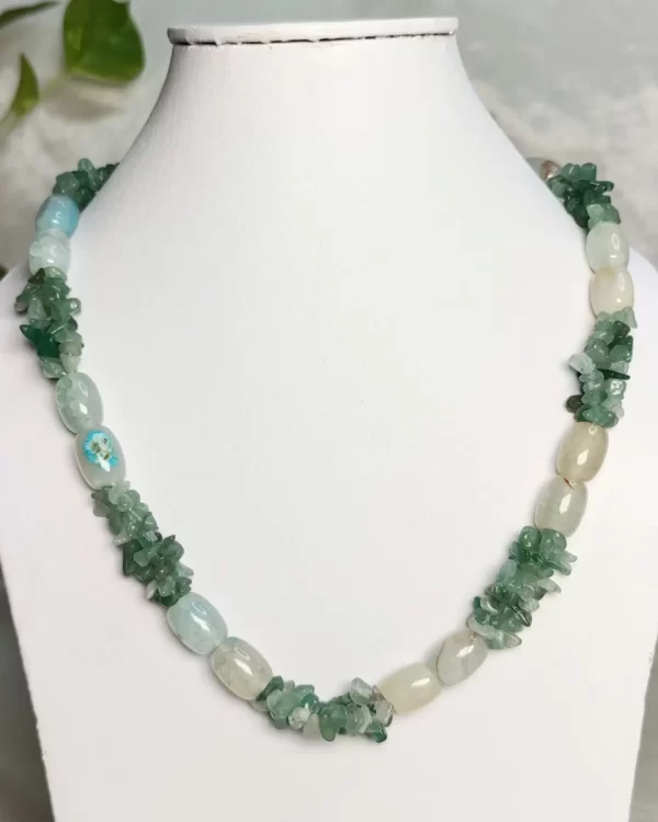 Evening Cool - DN0368 - Tumbles and chips of green Onyx, flecked, muddled, and spotted with whites and opal greys, come together in this elegant green 19” necklace made for an evening of being cool.