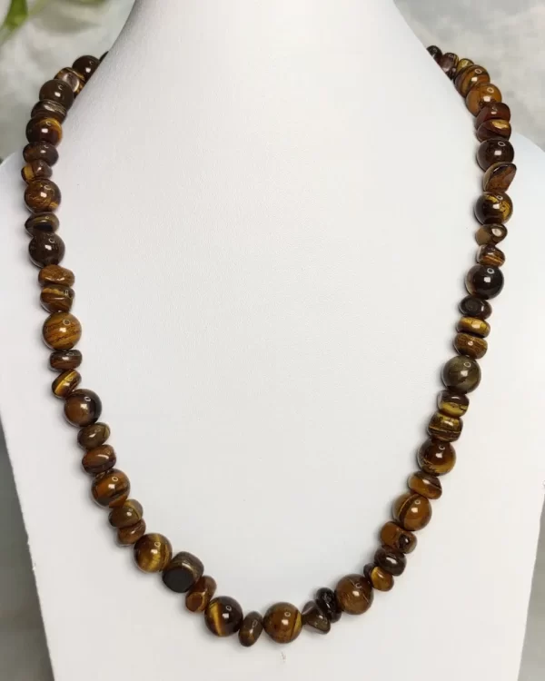 Tiger Trophy - DN0388 - For classics, the less said the better. 19” necklace, tiger’s eye tumbles and beads.