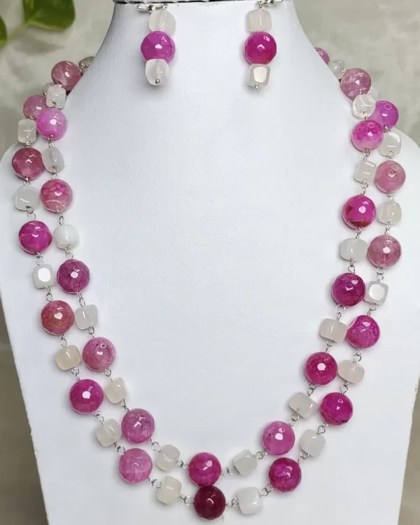 Think Pink - DN0457 - White Onyx cubes team up with Pink Onyx beads in two strands of 19” to give an enticingly beautiful and innocent piece suitable for those prim-n-proper tea parties!