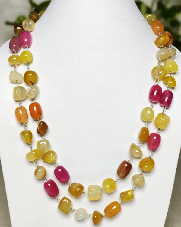 Fruit Punch - DN0522 - Spectacular all-the-shades-of-tropical-fruit Onyx tumbles in a 40” chain linked wonder piece.