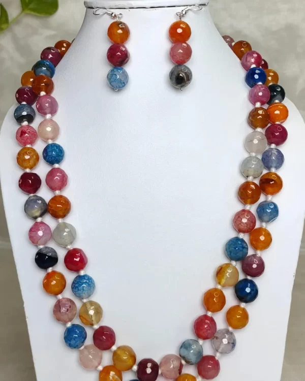 Colour Bomb - DN0561 - Two 19” knotted strands of Onyx beads come together in a medley of pure eye-popping colour.