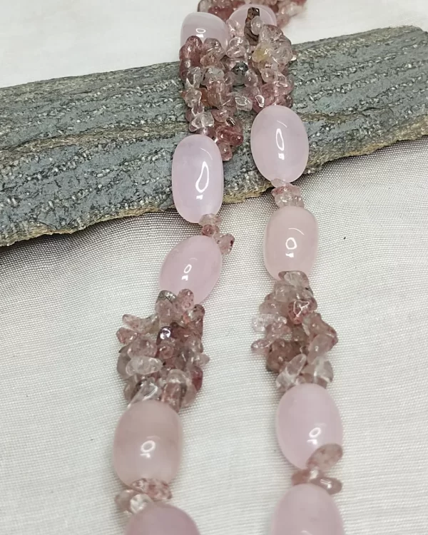 Pink Mist - DN0575 - Three strands of pink tinted Rose Quartz chips pool up with pink Rose Quartz beads to come up with a delightful 19” ring of rose around your neck!