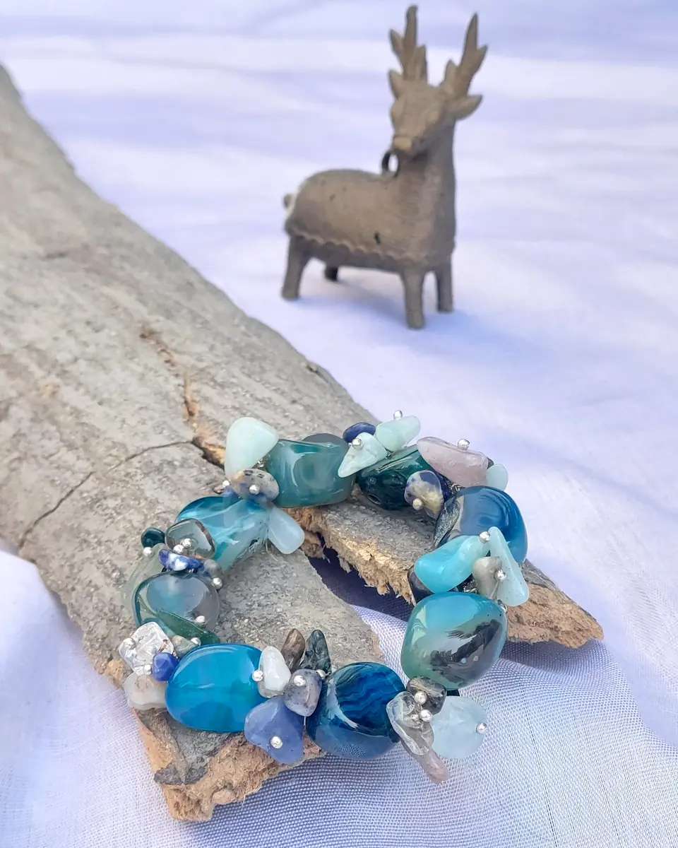 Blue Bandana - DB0052 - Bracelet - Several shades of sky-and-sea blue Onyx and Agate tumbles, chips, and beads come together in this piece that is elegant, yet has a splash of being just above everything else.