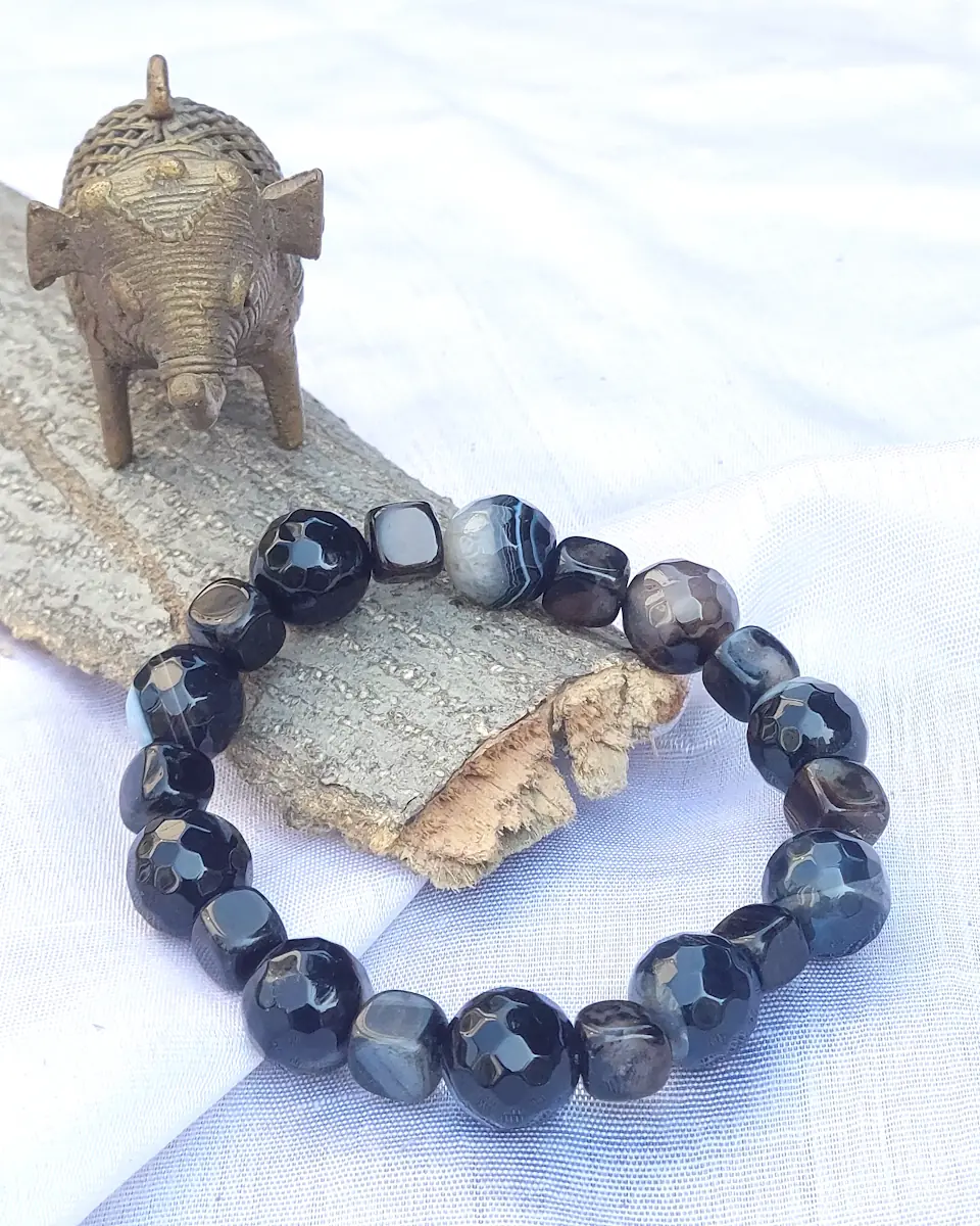 Black Thunder - DB0070 - Bracelet - Solid, mottled, and banded tumbles, beads and chips of midnight black coloured Onyx and Agate, strung together in this simple, but power statement piece, make you the woman of the moment.